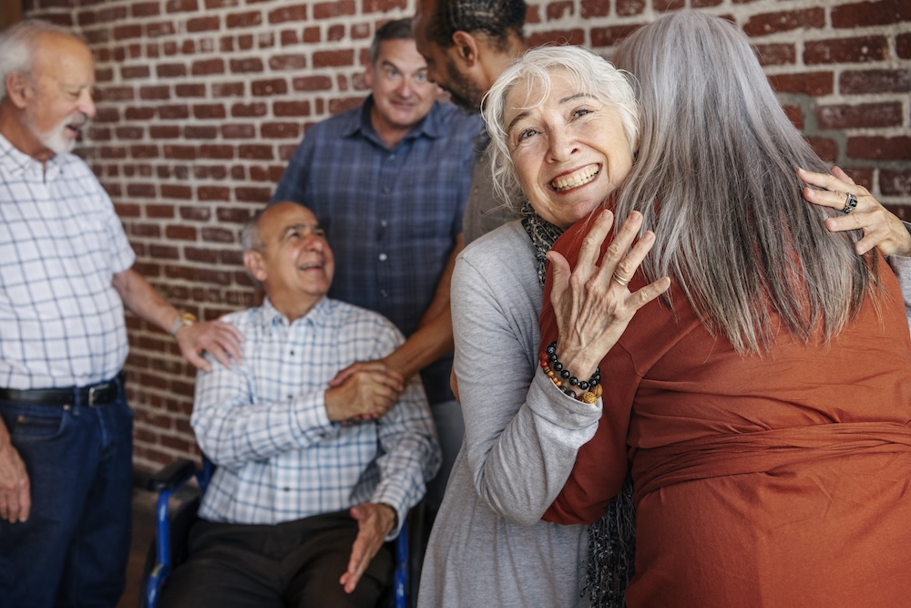 Group of senior friends enjoying their time at a dementia care community